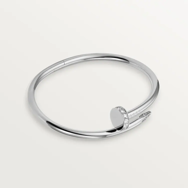 Cartier / JUSTE UN CLOU BRACELET Juste un Clou bracelet, classic, 18K white gold (750/1000), set with 32 brilliant-cut diamonds totaling 0.58 carat. Width: 3.5 mm (for size 17).