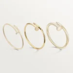 Cartier / JUSTE UN CLOU BRACELET Juste un Clou bracelet, classic, 18K yellow gold (750/1000), set with 32 brilliant-cut diamonds totaling 0.58 carat. Width: 3.5 mm (for size 17). - Image 6