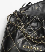CHANEL / CHANEL 22 HANDBAG Shiny Calfskin & Gold-Tone Metal Black - Image 4