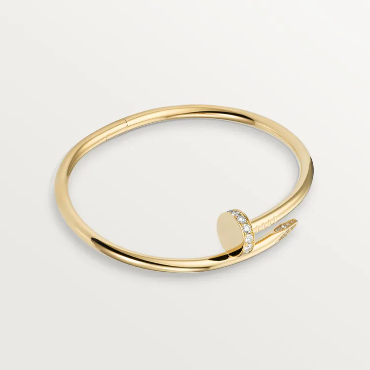 Cartier / JUSTE UN CLOU BRACELET Juste un Clou bracelet, classic, 18K yellow gold (750/1000), set with 32 brilliant-cut diamonds totaling 0.58 carat. Width: 3.5 mm (for size 17).