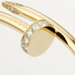 Cartier / JUSTE UN CLOU BRACELET Juste un Clou bracelet, classic, 18K yellow gold (750/1000), set with 32 brilliant-cut diamonds totaling 0.58 carat. Width: 3.5 mm (for size 17). - Image 8