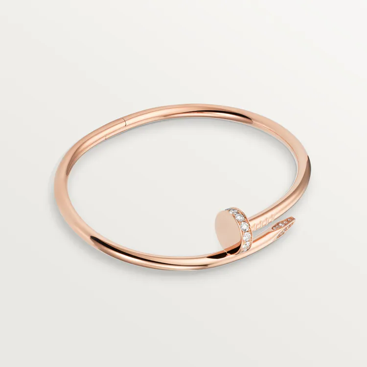 Cartier / JUSTE UN CLOU BRACELET Juste un Clou bracelet, classic, 18K rose gold (750/1000), set with 32 brilliant-cut diamonds totaling 0.58 carat. Width: 3.5 mm (for size 17).
