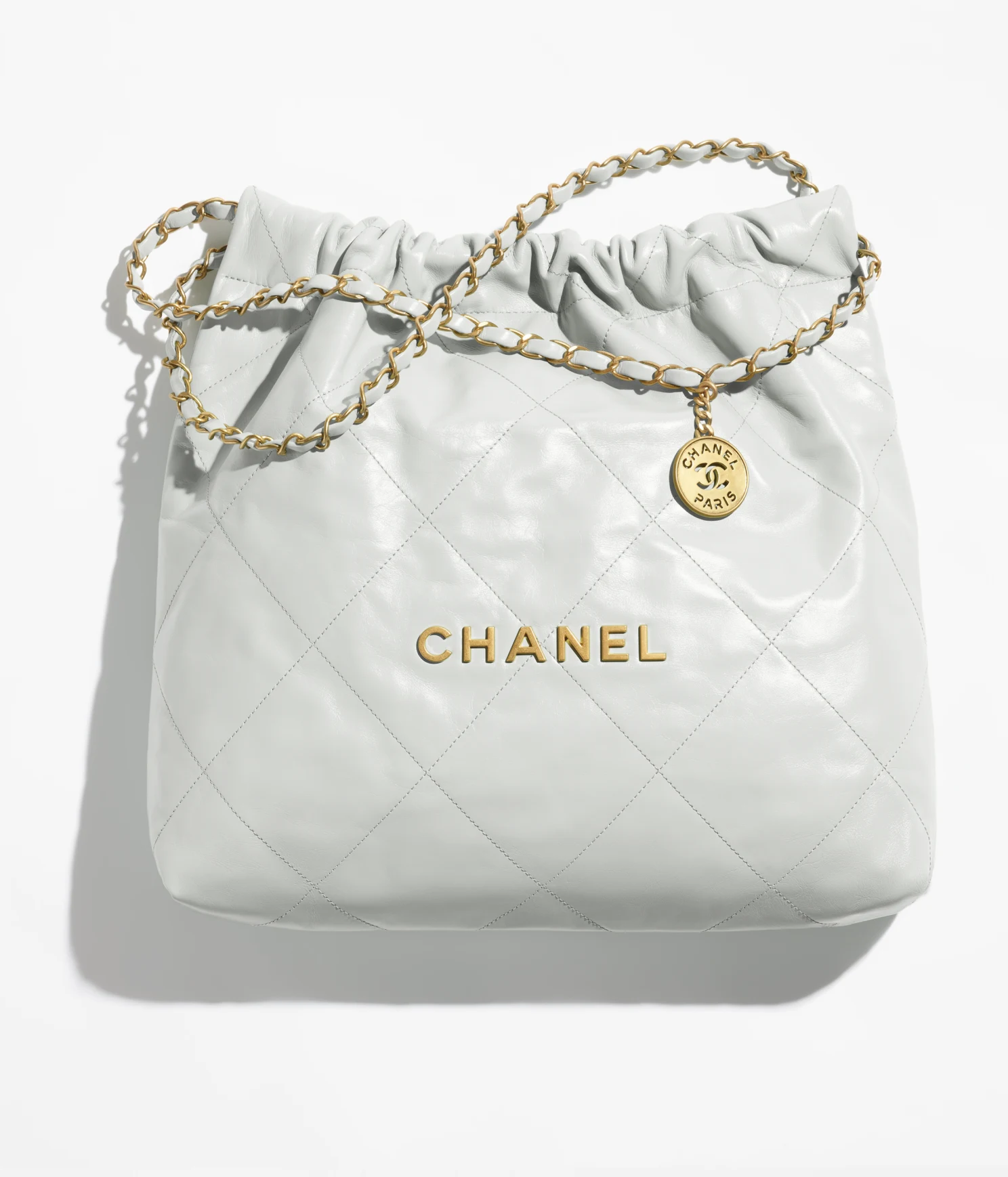 CHANEL / CHANEL 22 HANDBAG Shiny Calfskin & Gold-Tone Metal Light Blue