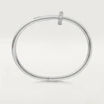 Cartier / JUSTE UN CLOU BRACELET Juste un Clou bracelet, classic, 18K white gold (750/1000), set with 32 brilliant-cut diamonds totaling 0.58 carat. Width: 3.5 mm (for size 17). - Image 5