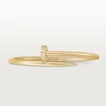 Cartier / JUSTE UN CLOU BRACELET Juste un Clou bracelet, classic, 18K yellow gold (750/1000), set with 32 brilliant-cut diamonds totaling 0.58 carat. Width: 3.5 mm (for size 17). - Image 4